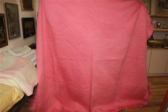 A rose pink and light pink reversible quilt, another reversible with yellow, the other mint green gingham and pink (3)